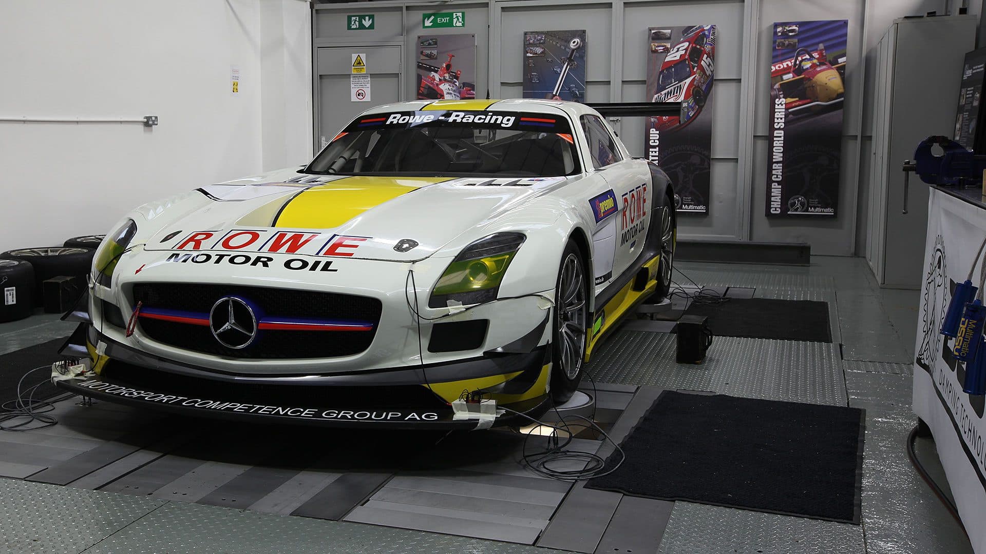 Mercedes-AMG race car on multi-post rig